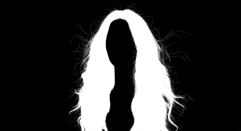 Portrait after hand image masking, individual hair strands preserved